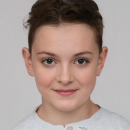 Joyful white child female with short  brown hair and brown eyes