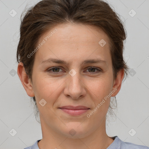 Joyful white adult female with short  brown hair and brown eyes