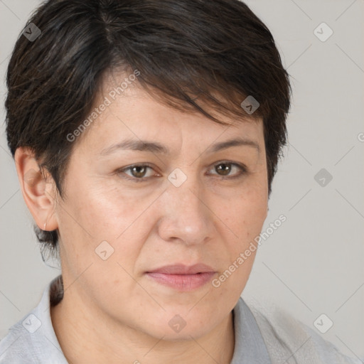 Joyful white adult female with short  brown hair and brown eyes