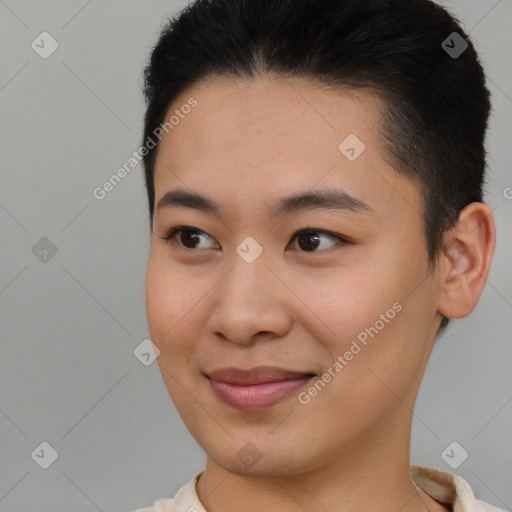 Joyful asian young-adult female with short  brown hair and brown eyes