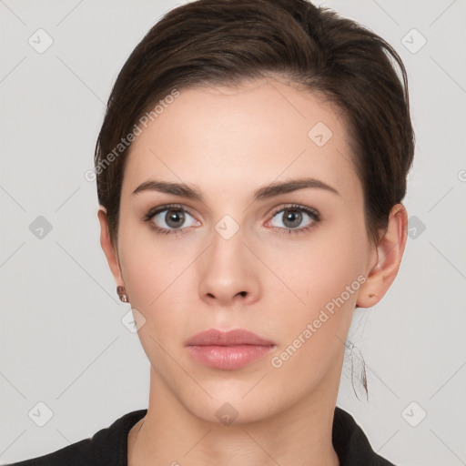 Neutral white young-adult female with short  brown hair and brown eyes