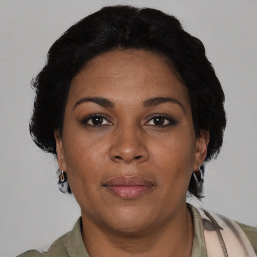 Neutral black adult female with short  brown hair and brown eyes