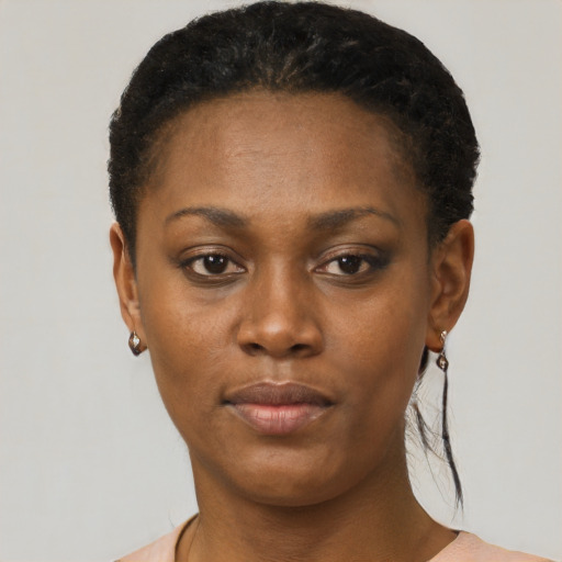 Neutral black young-adult female with short  black hair and brown eyes