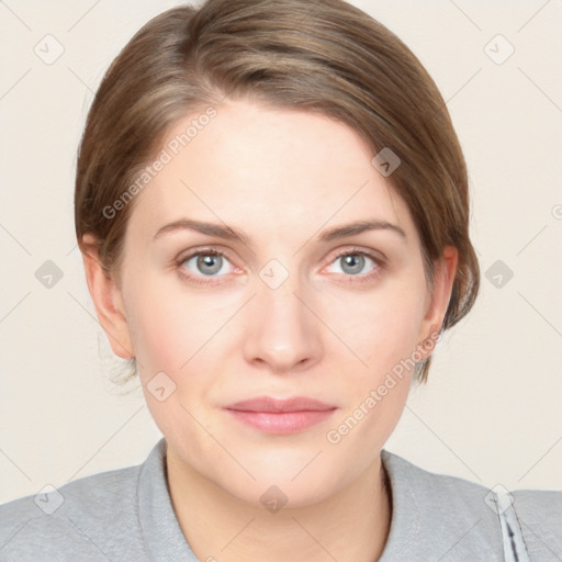 Joyful white young-adult female with medium  brown hair and blue eyes