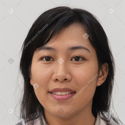 Joyful asian young-adult female with medium  brown hair and brown eyes