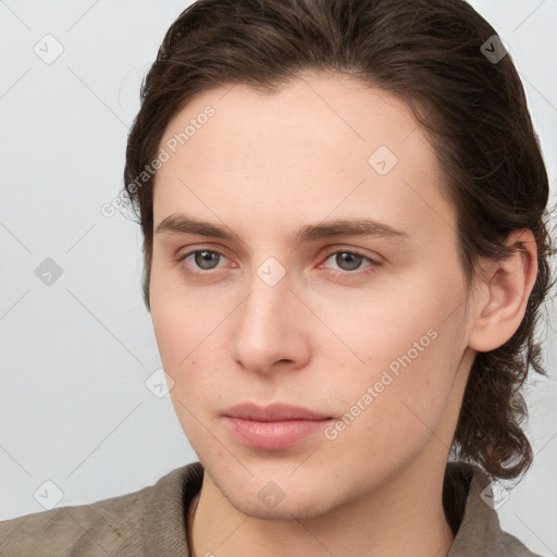 Joyful white young-adult male with medium  brown hair and brown eyes