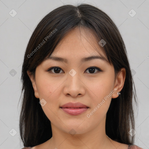 Joyful asian young-adult female with medium  brown hair and brown eyes