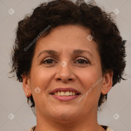 Joyful white adult female with short  brown hair and brown eyes