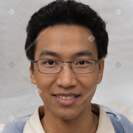 Joyful white adult male with short  black hair and brown eyes