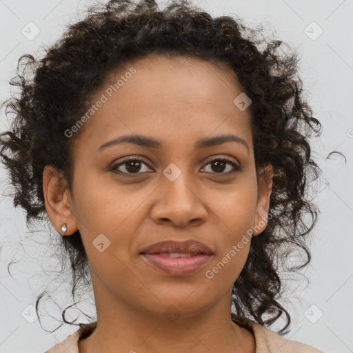 Joyful black young-adult female with medium  brown hair and brown eyes