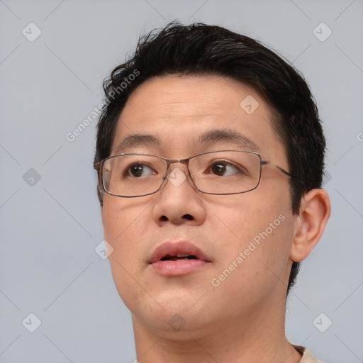 Neutral white adult male with short  brown hair and brown eyes