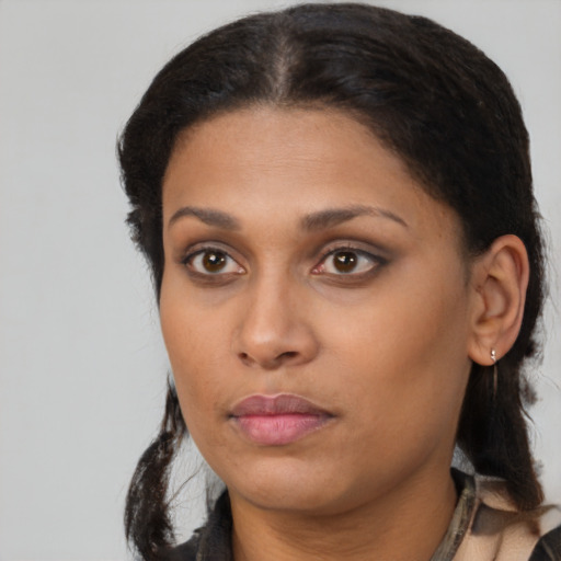Neutral black young-adult female with long  black hair and brown eyes