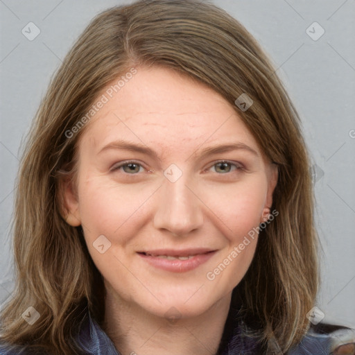 Joyful white adult female with medium  brown hair and grey eyes