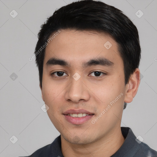 Joyful white young-adult male with short  black hair and brown eyes