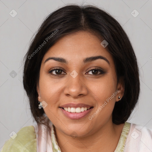 Joyful latino young-adult female with medium  brown hair and brown eyes