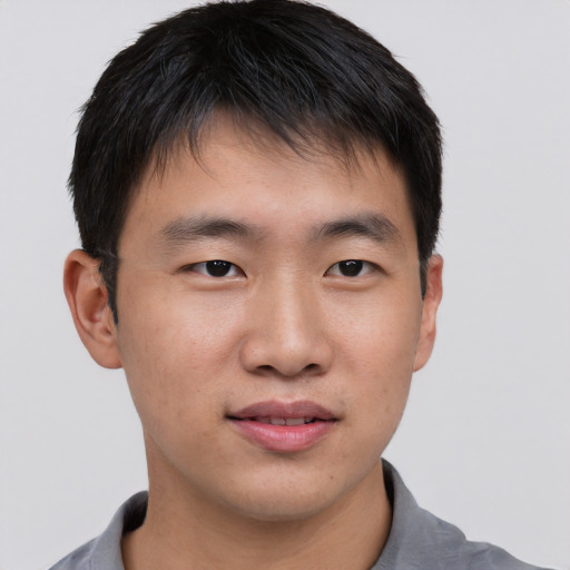 Neutral asian young-adult male with short  brown hair and brown eyes