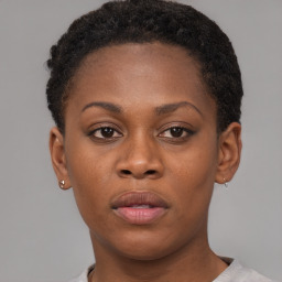 Neutral black young-adult female with short  brown hair and brown eyes