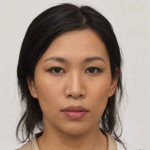 Neutral asian young-adult female with medium  brown hair and brown eyes