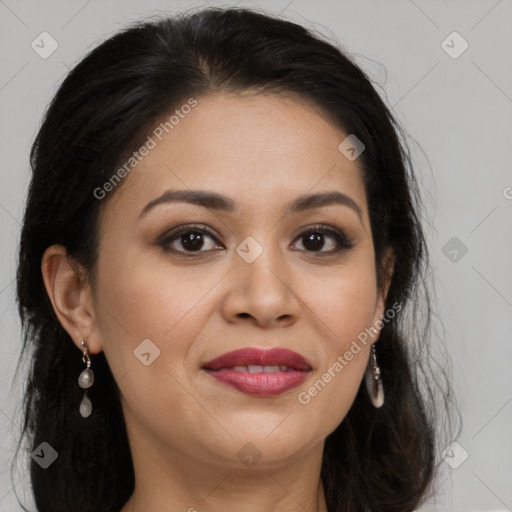 Joyful latino young-adult female with long  brown hair and brown eyes