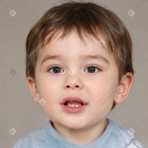 Joyful white child male with short  brown hair and brown eyes