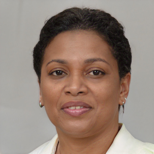 Joyful white adult female with short  brown hair and brown eyes