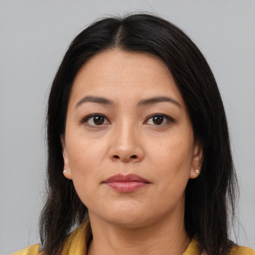 Neutral asian young-adult female with medium  brown hair and brown eyes