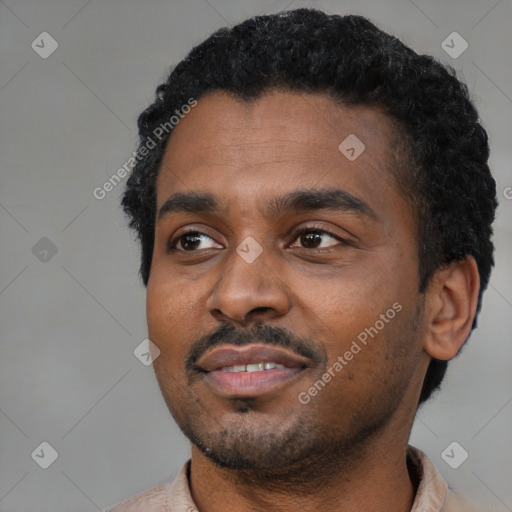 Neutral black young-adult male with short  black hair and brown eyes