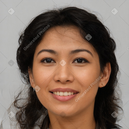 Joyful latino young-adult female with long  brown hair and brown eyes