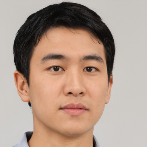 Neutral asian young-adult male with short  black hair and brown eyes