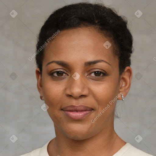 Joyful black young-adult female with short  brown hair and brown eyes