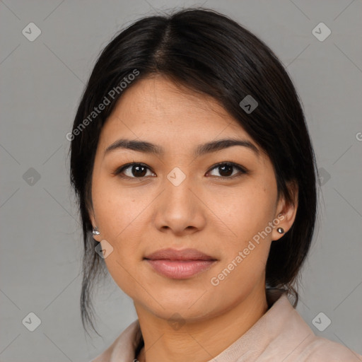 Joyful latino young-adult female with medium  black hair and brown eyes