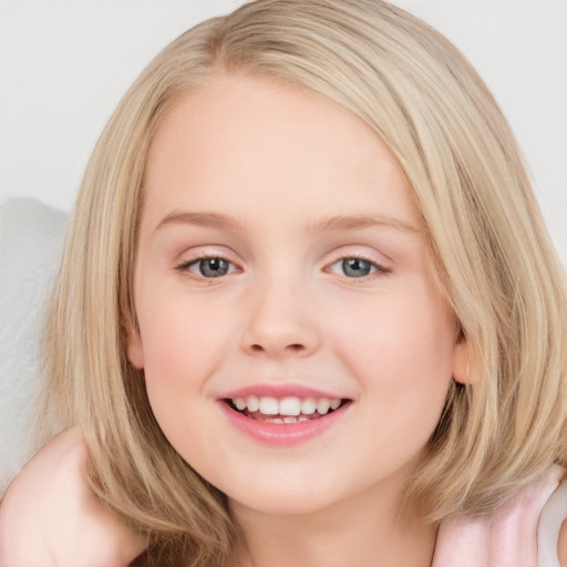 Joyful white child female with medium  brown hair and blue eyes