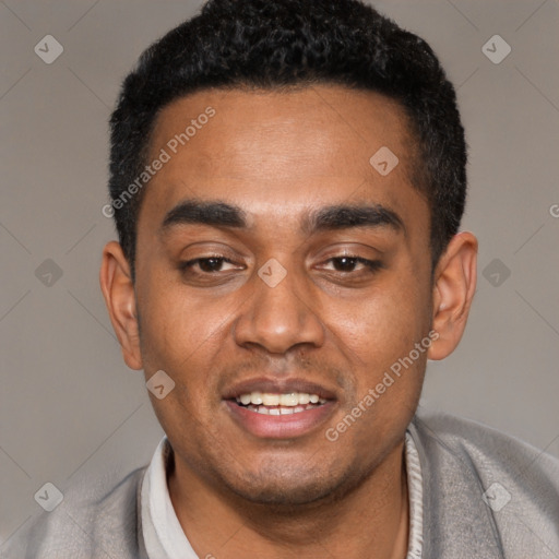 Joyful black young-adult male with short  black hair and brown eyes