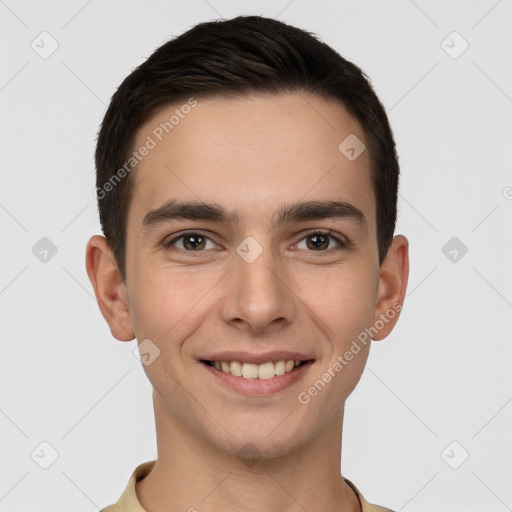 Joyful white young-adult male with short  brown hair and brown eyes