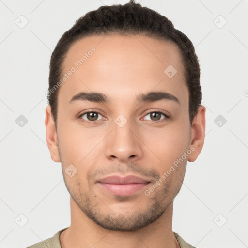 Joyful white young-adult male with short  black hair and brown eyes