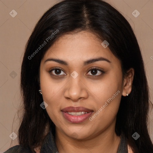 Joyful latino young-adult female with long  brown hair and brown eyes