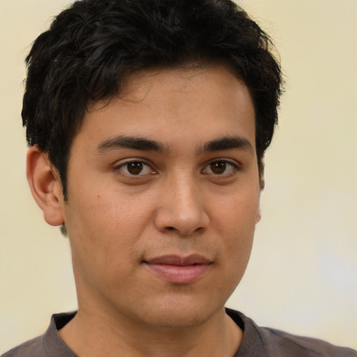 Neutral latino young-adult male with short  brown hair and brown eyes