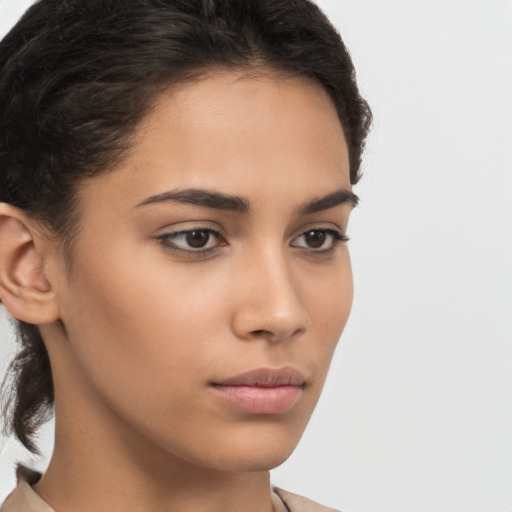 Neutral latino young-adult female with medium  brown hair and brown eyes