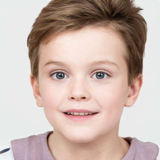 Joyful white child female with short  brown hair and grey eyes