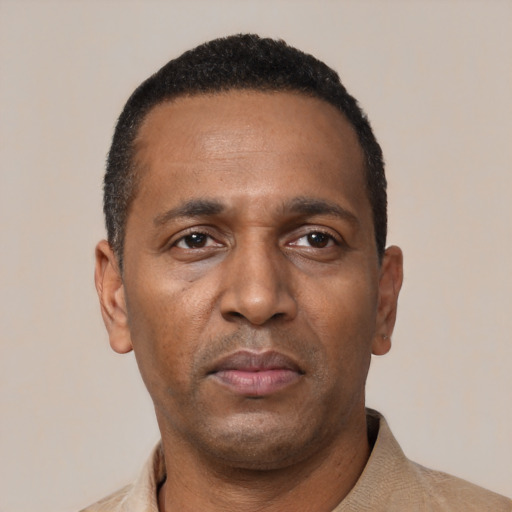 Neutral black adult male with short  black hair and brown eyes