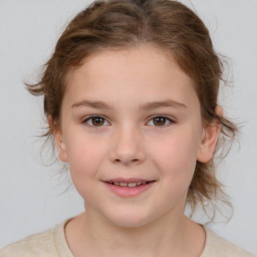 Joyful white child female with medium  brown hair and brown eyes