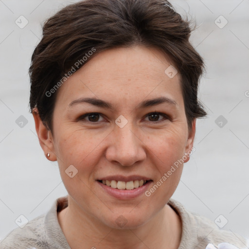 Joyful white adult female with short  brown hair and brown eyes