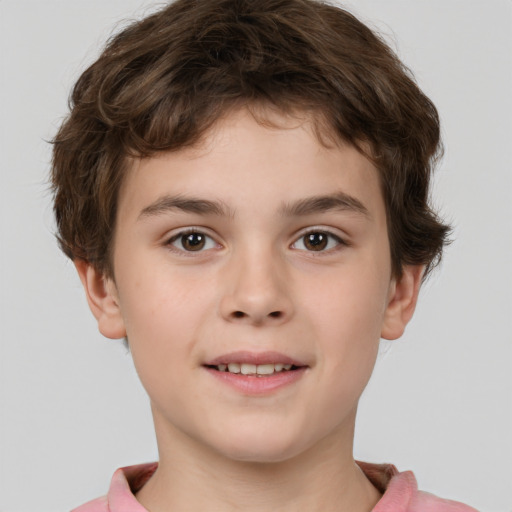 Joyful white child male with short  brown hair and brown eyes