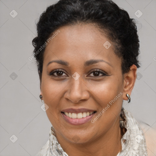 Joyful latino adult female with short  brown hair and brown eyes