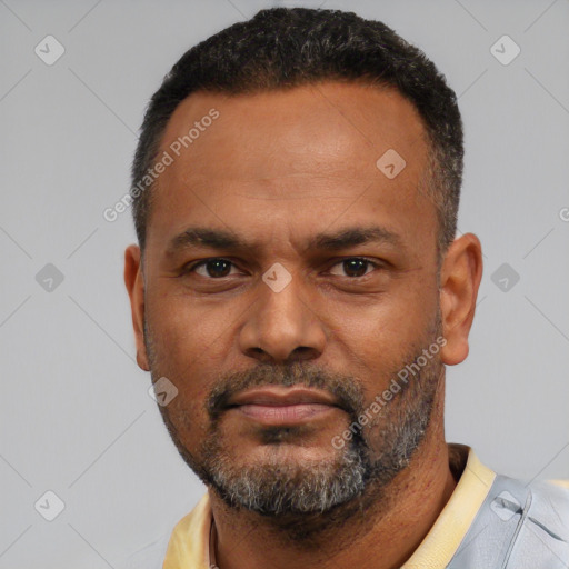 Neutral latino adult male with short  black hair and brown eyes