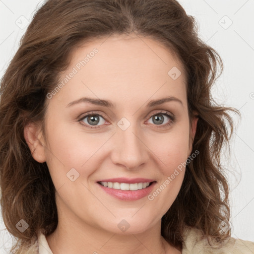 Joyful white young-adult female with medium  brown hair and green eyes