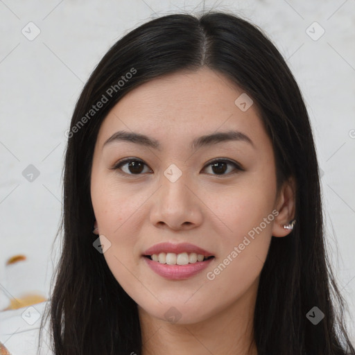 Joyful asian young-adult female with long  brown hair and brown eyes