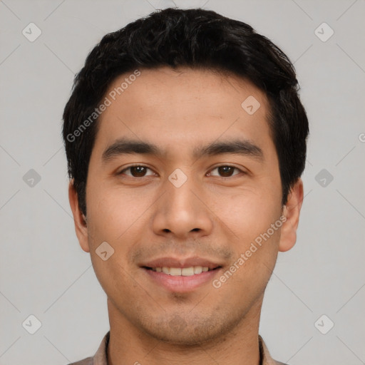 Joyful asian young-adult male with short  black hair and brown eyes