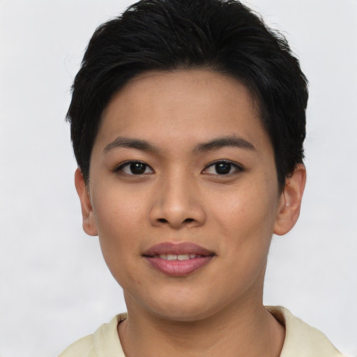 Joyful asian young-adult female with short  black hair and brown eyes