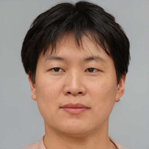 Neutral asian young-adult female with short  brown hair and brown eyes